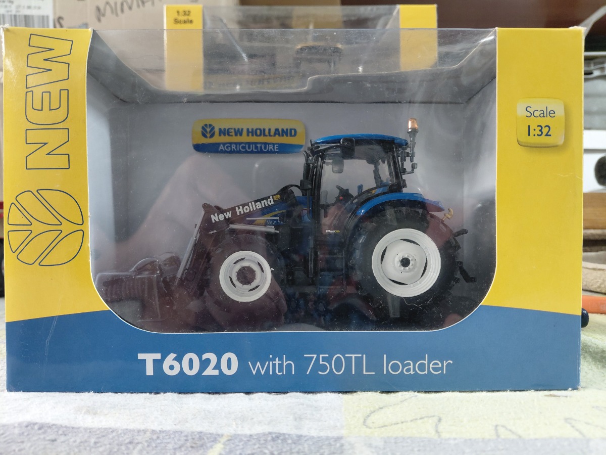 NH 6020 With 750 TL Loader UH2863. Bien lire la description et